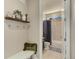 Well-lit bathroom featuring a shower-tub combo, decorative shelves, and modern fixtures at 2454 Ambience Ln, Castle Rock, CO 80109