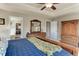 Spacious bedroom features tray ceilings and carpeted floors, offering a serene retreat at 2454 Ambience Ln, Castle Rock, CO 80109