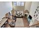 High-angle view of an open-concept living space with vaulted ceilings and lots of natural light at 2454 Ambience Ln, Castle Rock, CO 80109