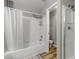 A full bathroom with a shower-tub combination and a separate water closet at 4013 S Carson St # C, Aurora, CO 80014