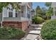 Charming home featuring a covered entrance with landscaped yard and a welcoming walkway at 4013 S Carson St # C, Aurora, CO 80014