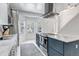 Modern kitchen featuring granite countertops, stainless steel appliances and an island with cooktop at 4013 S Carson St # C, Aurora, CO 80014