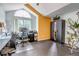 Bright office with a large window, ample desk space, and a modern minimalist design at 4013 S Carson St # C, Aurora, CO 80014