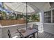 Outdoor patio with a table and chairs, perfect for relaxing or dining outdoors at 4013 S Carson St # C, Aurora, CO 80014