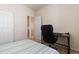 Neutral bedroom featuring a closet, and a desk, providing a functional and comfortable space at 3454 Cascina Pl # D, Highlands Ranch, CO 80126