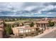 An elevated view showcases the community pool with beautiful views and landscaping at 3454 Cascina Pl # D, Highlands Ranch, CO 80126