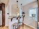 Eat-in kitchenette with granite countertops and seating for two at 2260 Leyden St, Denver, CO 80207