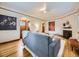 Stylish living room with hardwood floors, white walls, and dark trim creating a cozy ambiance at 2260 Leyden St, Denver, CO 80207