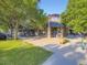 Charming storefront with outdoor seating, surrounded by lush greenery, offering a welcoming atmosphere at 2260 Leyden St, Denver, CO 80207