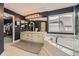 Spacious bathroom featuring a double vanity, soaking tub, and a walk-in closet at 1312 Pine View Rd, Golden, CO 80403