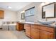 This stunning bathroom features dual sinks, granite countertops, stylish mirrors, and an adjacent soaking tub at 1456 S Jasper St, Aurora, CO 80017