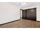 Spacious bedroom with a closet and wood-look flooring for a modern touch at 1456 S Jasper St, Aurora, CO 80017