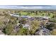 Community aerial view featuring lush greenery, golf course, and community gathering locations at 7126 Cedarwood Cir, Boulder, CO 80301
