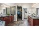 The main bathroom has dual vanities, granite countertops, and an enclosed glass shower at 7126 Cedarwood Cir, Boulder, CO 80301