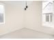 Bright bedroom with neutral carpet, fresh paint and a contemporary light fixture at 5780 W 92 Ave, Westminster, CO 80031