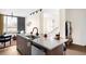 Open floor plan featuring a modern kitchen flowing into a cozy living room at 5780 W 92 Ave, Westminster, CO 80031
