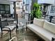 Cozy balcony with seating area and view of the neighborhood at 2010 S Holly St # 3, Denver, CO 80222