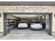 Spacious two car garage with ample storage, featuring durable concrete flooring at 2010 S Holly St # 3, Denver, CO 80222