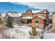 Aerial view of house showcasing backyard and surrounding neighborhood at 1128 Starglow Pl, Highlands Ranch, CO 80126