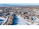 Large-scale aerial view of neighborhood and surrounding landscape at 1128 Starglow Pl, Highlands Ranch, CO 80126