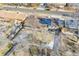 Aerial view of house with solar panels on roof at 2681 S Newport St, Denver, CO 80224