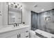 Modern basement bathroom with a walk-in shower at 2681 S Newport St, Denver, CO 80224