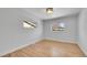 Spacious bedroom with hardwood floors and large windows at 2681 S Newport St, Denver, CO 80224