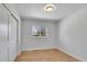 Well-lit bedroom with hardwood floors and neutral tones at 2681 S Newport St, Denver, CO 80224