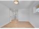 Bright bedroom with hardwood floors and neutral wall colors at 2681 S Newport St, Denver, CO 80224