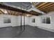 Unfinished basement space with three windows and ceiling piping at 4821 Bluegate Dr, Highlands Ranch, CO 80130