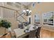 Dining room featuring hardwood floors, staircase, chandelier, and elegant table setting at 4821 Bluegate Dr, Highlands Ranch, CO 80130