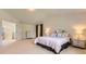 Bright main bedroom with vaulted ceilings, ensuite bathroom, and a beautiful view at 11803 E 114Th Pl, Commerce City, CO 80640