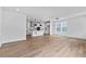 Modern living space with hardwood floors, recessed lighting and a sleek kitchen visible at 223 Washington St, Erie, CO 80516