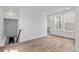 Living room with hardwood flooring and a staircase leading down to the lower level at 223 Washington St, Erie, CO 80516