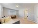 Bedroom with daybed, bench, and window letting in natural light at 7734 Terry Ct, Arvada, CO 80007