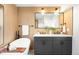 Elegant bathroom featuring a soaking tub, dual sink vanity, and modern finishes at 4131 Osage St, Denver, CO 80211