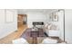 Bright living room with fireplace, stylish decor, and a cozy seating area at 4131 Osage St, Denver, CO 80211
