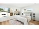 Inviting bedroom filled with natural light, featuring hardwood floors and neighborhood views at 4131 Osage St, Denver, CO 80211
