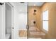 Beautiful shower with glass and tile surround at 4131 Osage St, Denver, CO 80211