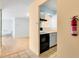 The kitchen is accessible from the living room with appliances, ready for culinary exploration at 955 Eudora St # 1106, Denver, CO 80220