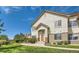 Two-story home features a manicured lawn, mature trees, and tasteful exterior paint at 22580 E Ontario Dr # 202, Aurora, CO 80016