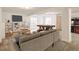 Spacious finished basement perfect for entertaining, featuring a pool table and classic arcade game at 6924 W Euclid Pl # A, Littleton, CO 80123