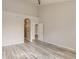 Neutral room with modern flooring and doorways at 6924 W Euclid Pl # A, Littleton, CO 80123