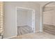 Bright room with modern flooring and white trim at 6924 W Euclid Pl # A, Littleton, CO 80123