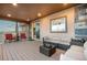 The outdoor deck area has neutral toned patio furniture and mountain views at 942 S County Road 129 Rd, Bennett, CO 80102