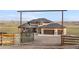 Beautiful custom home with a gated entrance and plenty of room to stretch out and enjoy the country life at 942 S County Road 129 Rd, Bennett, CO 80102