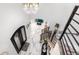Breathtaking aerial view capturing the grand foyer, elegant staircase, and stylish design of the home at 942 S County Road 129 Rd, Bennett, CO 80102