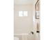 Clean and bright bathroom features white subway tile and a bathtub at 133 S Xavier St, Denver, CO 80219