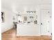 A sleek kitchen merges with a dining area at 133 S Xavier St, Denver, CO 80219