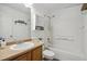 Bright bathroom with tub and shower combination, and vanity with ample storage at 14881 E 117Th Ave, Commerce City, CO 80603